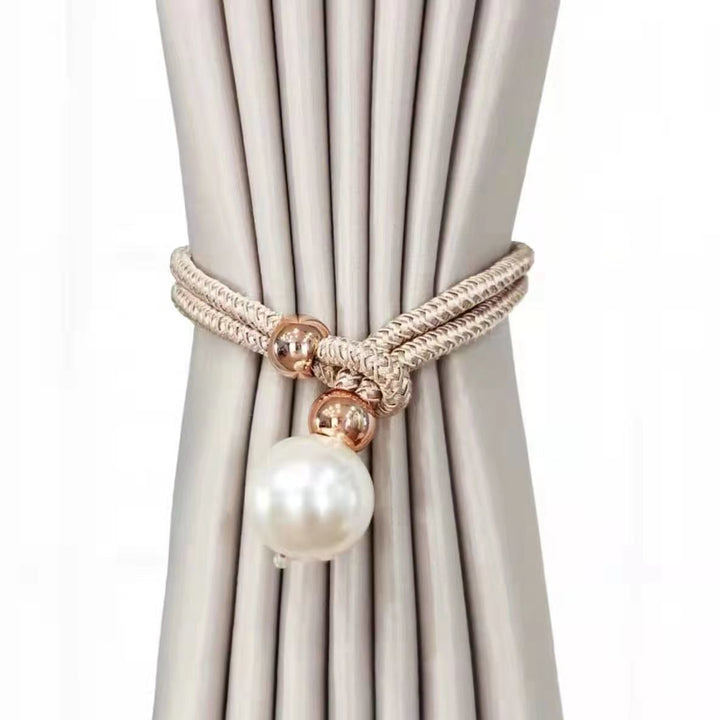 Elegant curtain tieback with decorative pearl