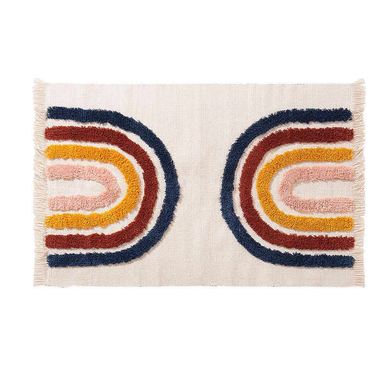 decorative woven bathroom runner with botanical jacquard pattern and fringes