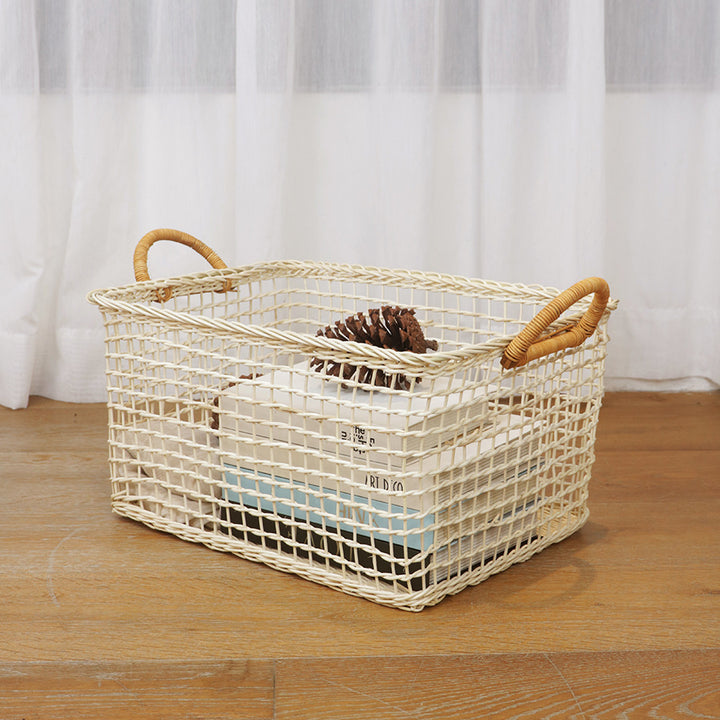Handmade storage basket with braided handles