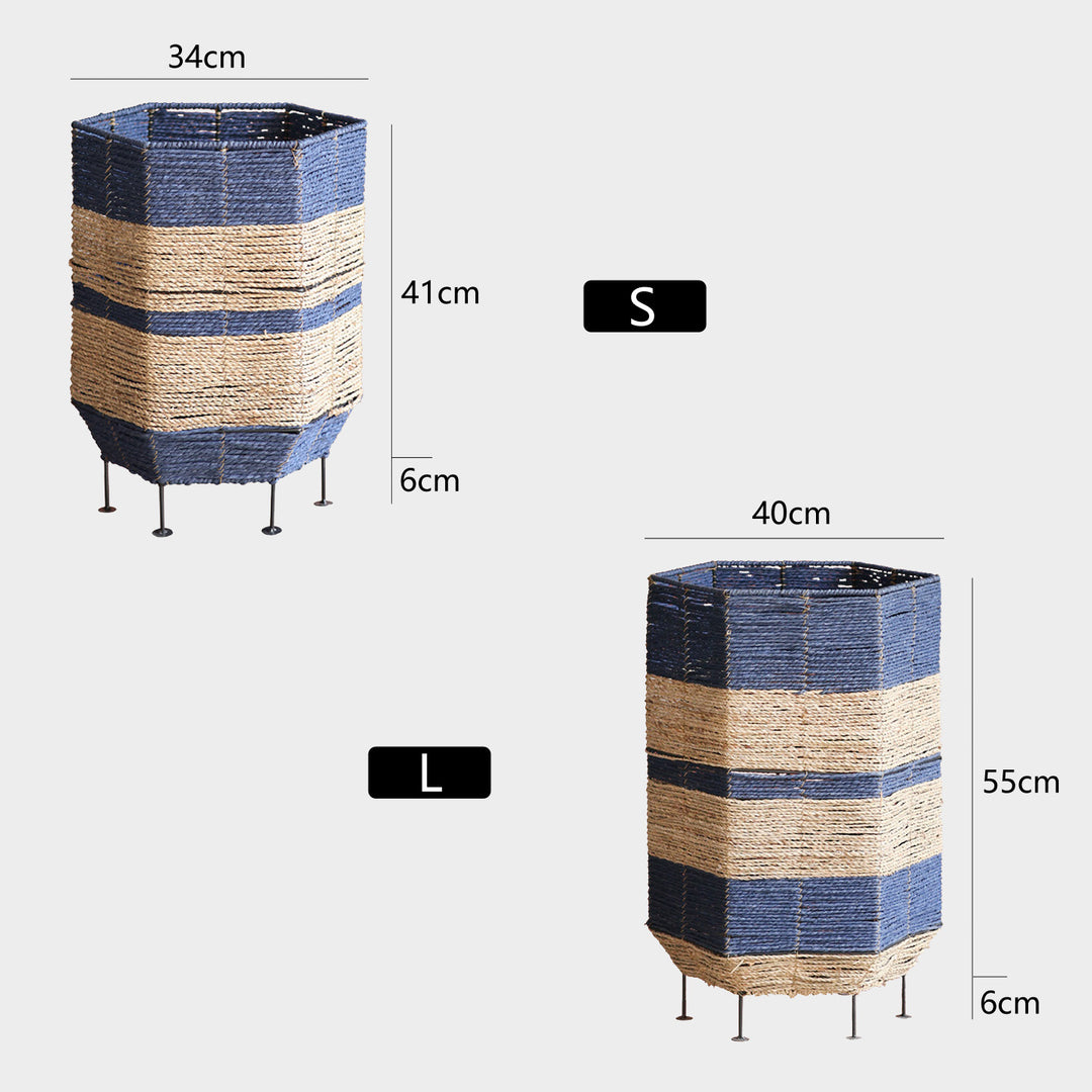 Stylish laundry basket made of rattan with metal legs