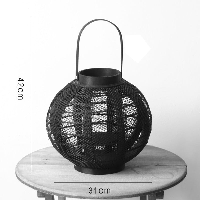 Elegant metal lantern with net design