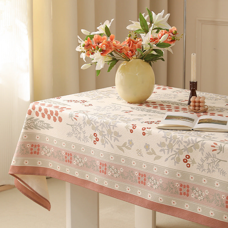 Rectangular easy-care tablecloth in floral jacquard with decorative border