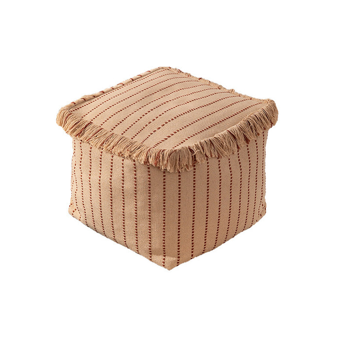 Woven decorative pouf with fringes and structured striped look