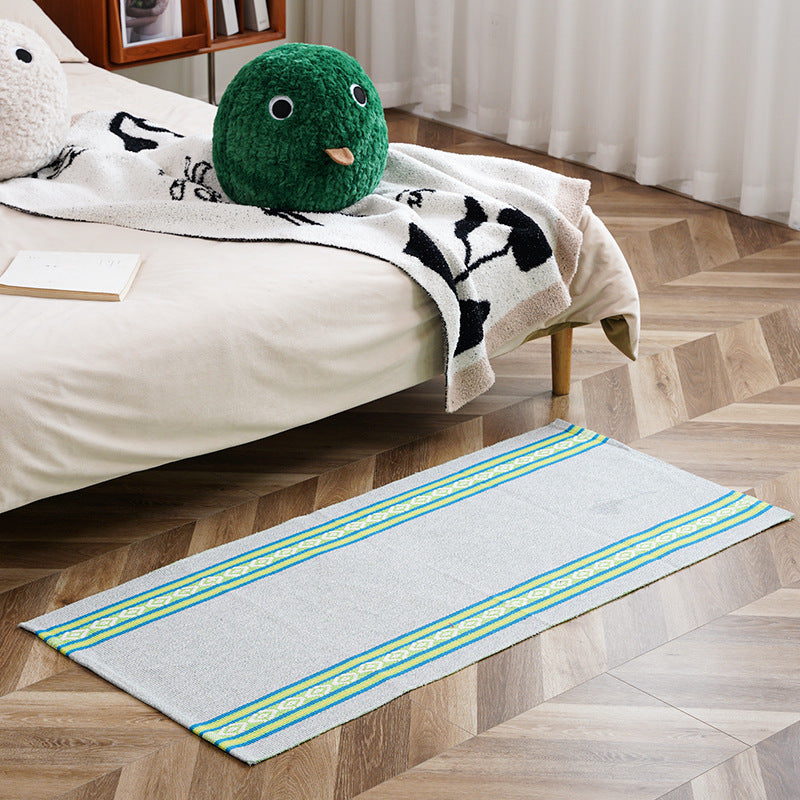 Flat-woven runner rug with check pattern and decorative border stripe