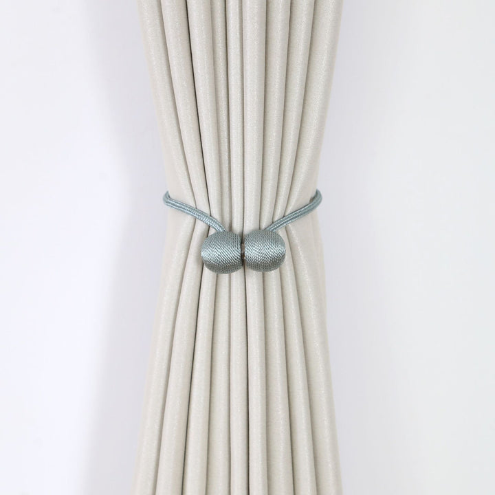 Decorative curtain tieback