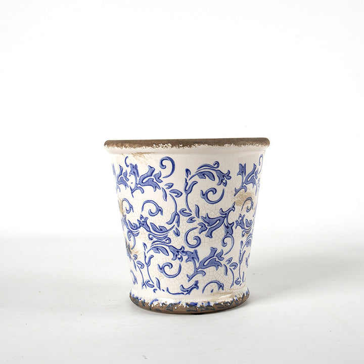 Decorative ceramic flower pot with floral design
