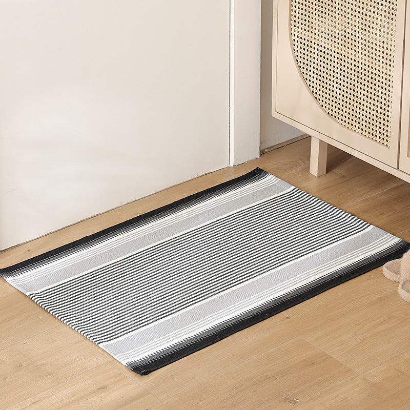 Striped cotton doormat with non-slip bottom and decorative woven edge