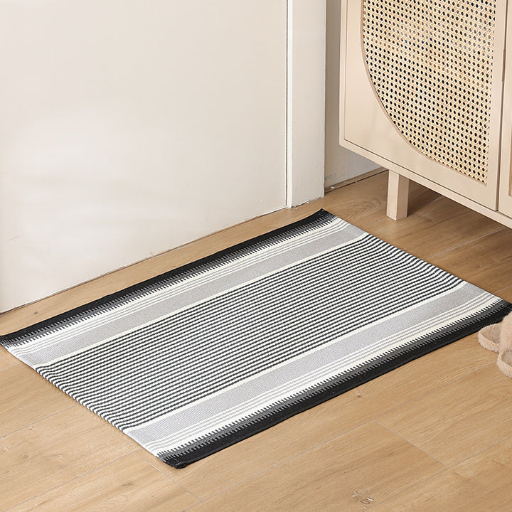 Striped cotton doormat with non-slip bottom and decorative woven edge