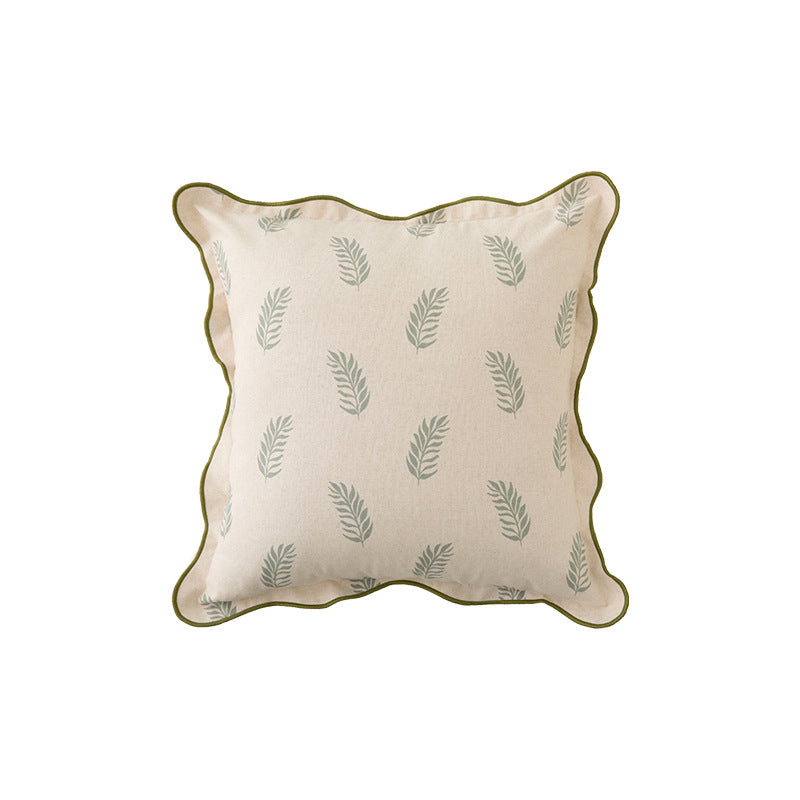 Decorative square decorative pillow with floral print, curved edge and removable cover
