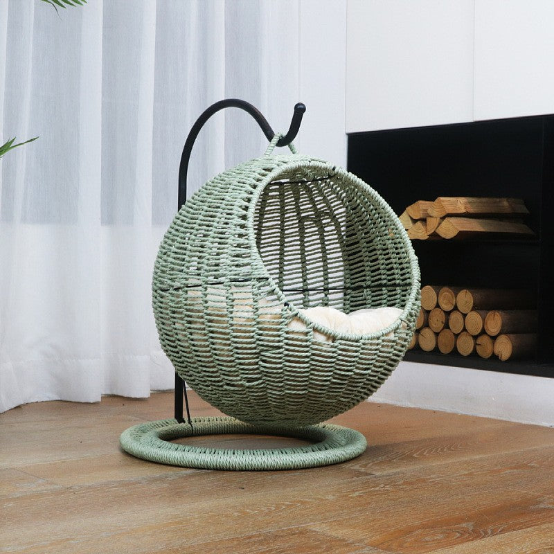 Hanging chair made of rattan with comfortable cushion