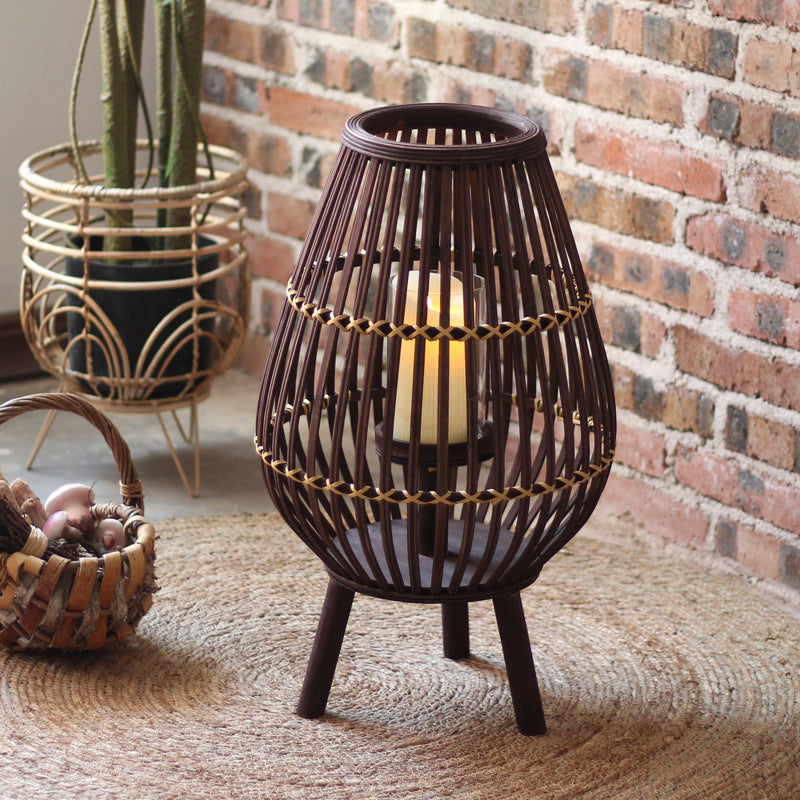 Stylish lantern made of rattan with wooden frame