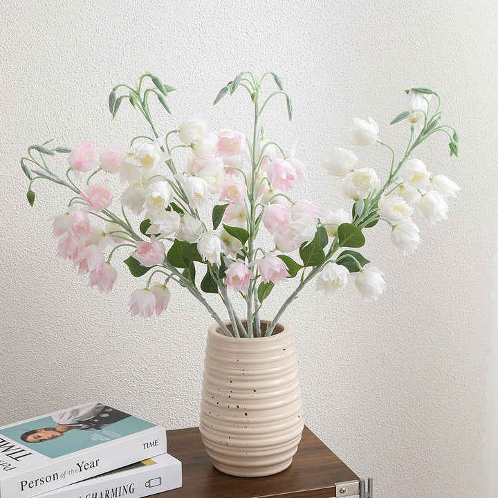 Artificial orchid bouquet with intricate flowers