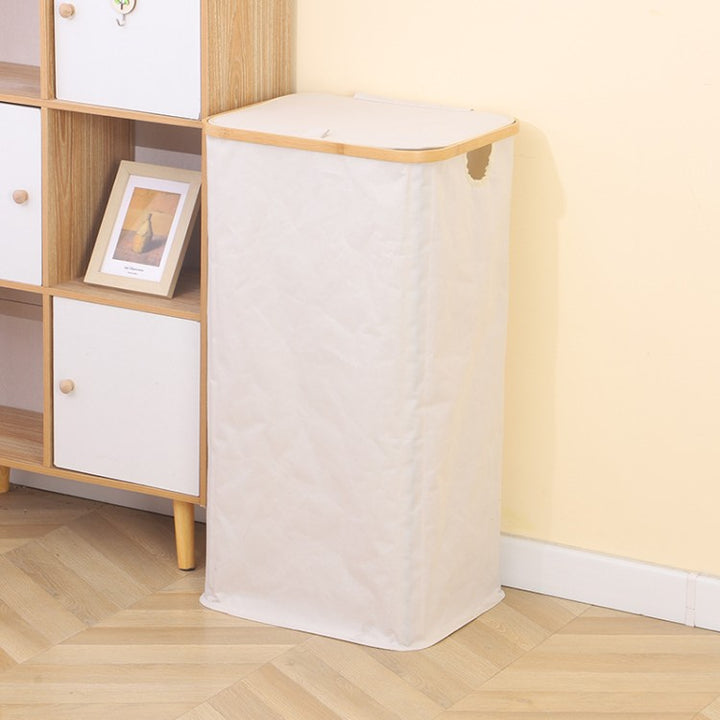 Stylish laundry basket with wooden lid