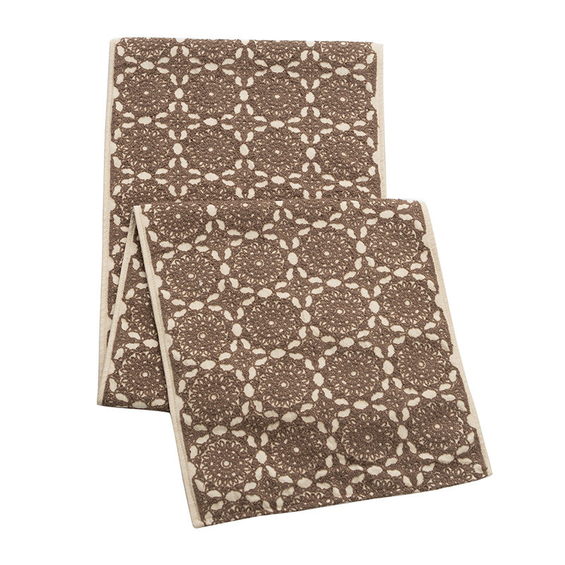 Runner with ornamental medallion jacquard structure and non-slip underside