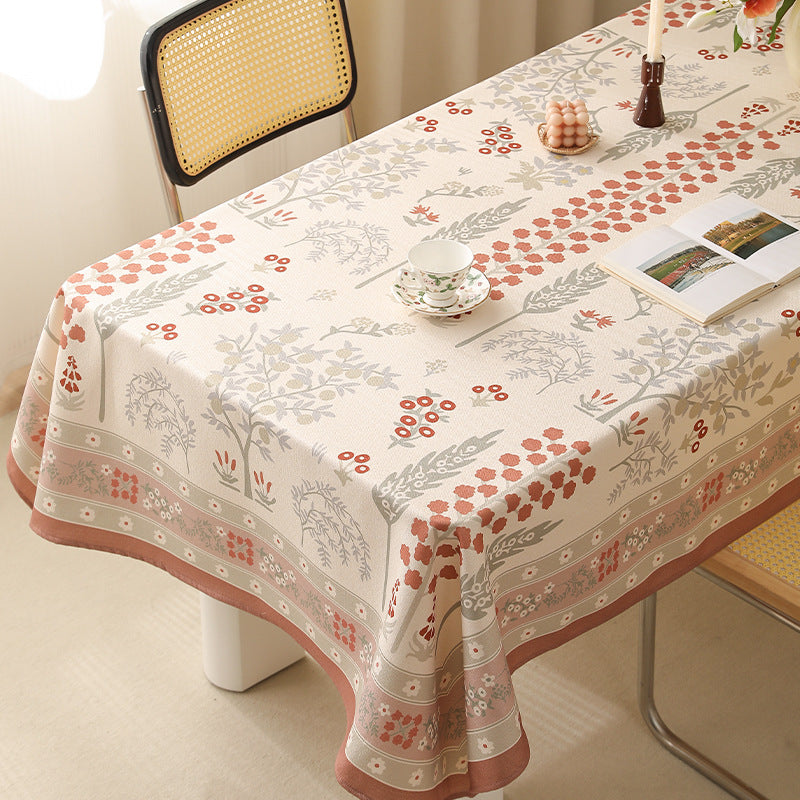 Rectangular easy-care tablecloth in floral jacquard with decorative border