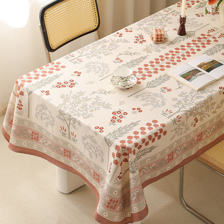 Rectangular easy-care tablecloth in floral jacquard with decorative border