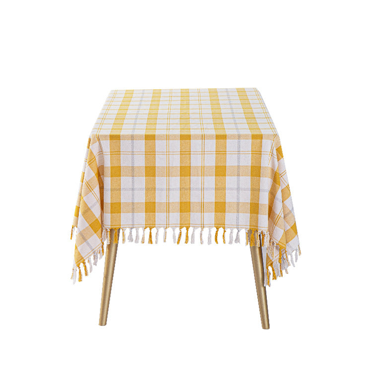 Rectangular checked cotton tablecloth with decorative fringes and light linen finish