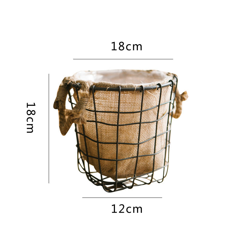 Decorative storage basket made of wire and linen