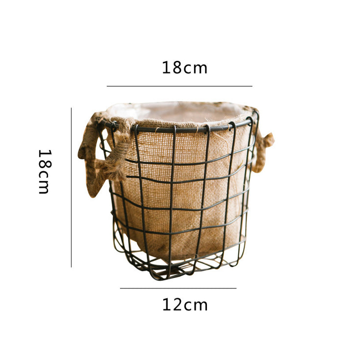 Decorative storage basket made of wire and linen