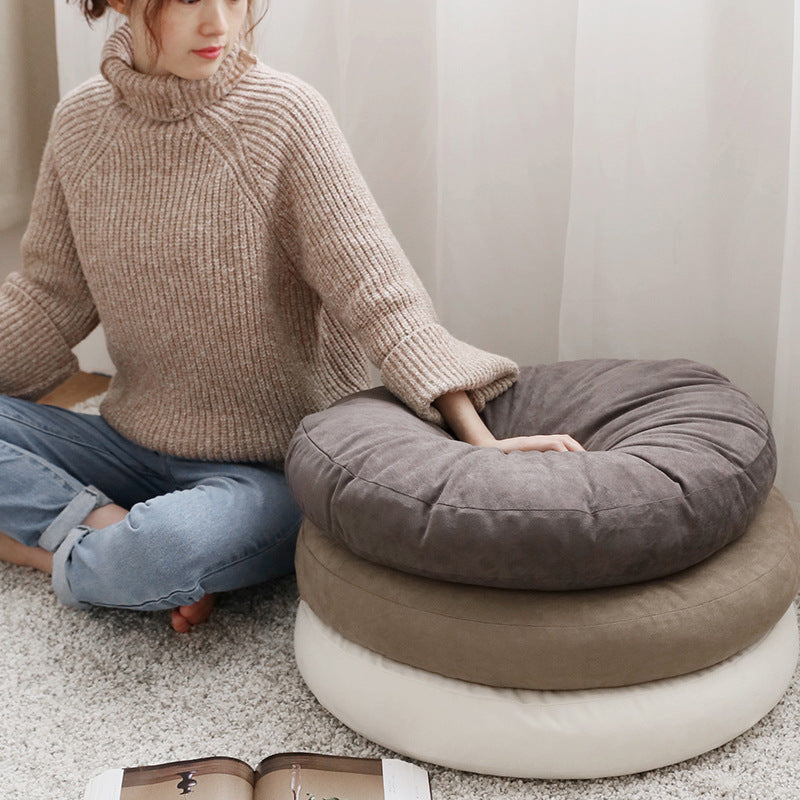 Round seat pouf with soft velvet cover, removable zipper, and shape-stable filling