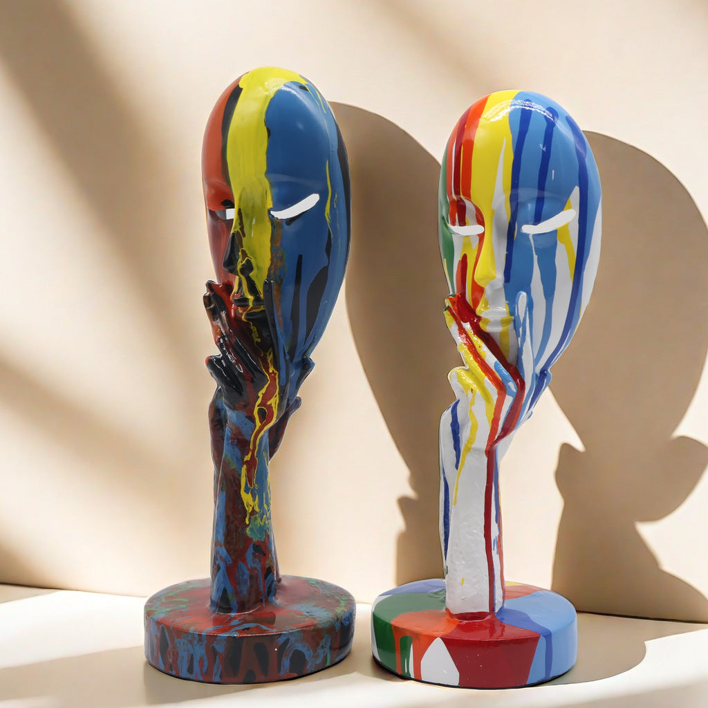 Artful decoration in the form of a contemplative figure