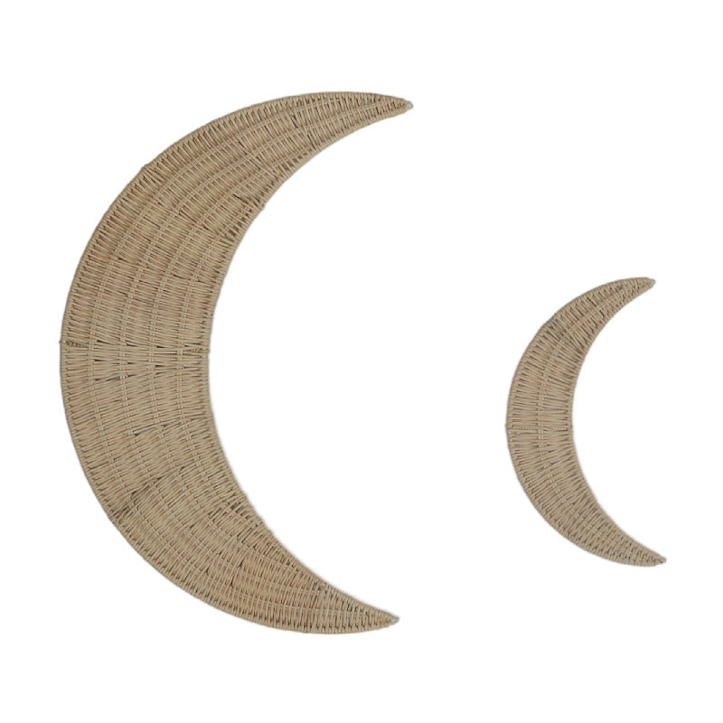 Wall decoration made of handwoven rattan in moon design