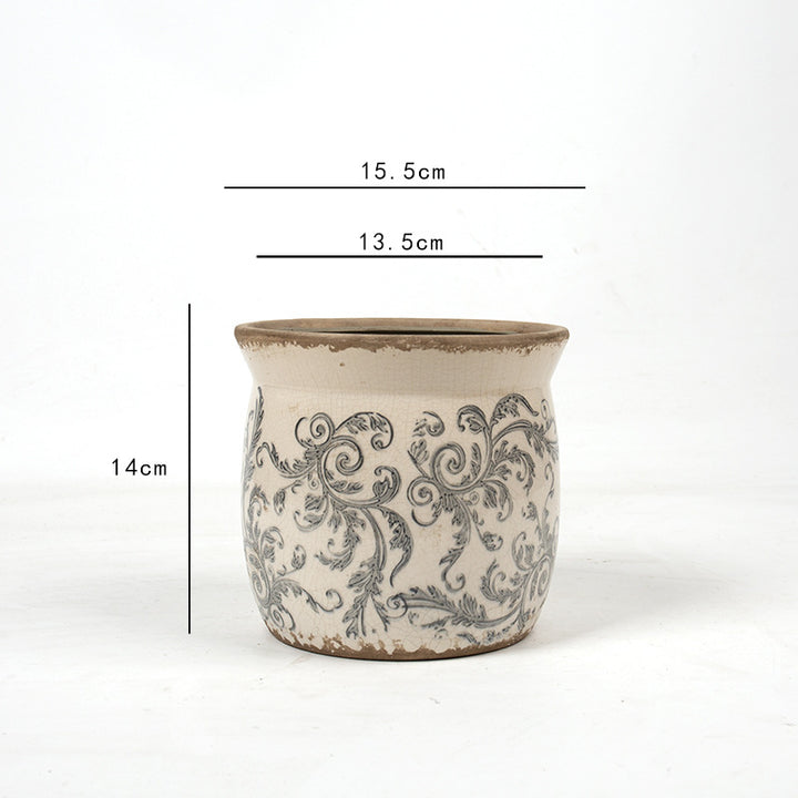 Decorative ceramic plant container with artistic design