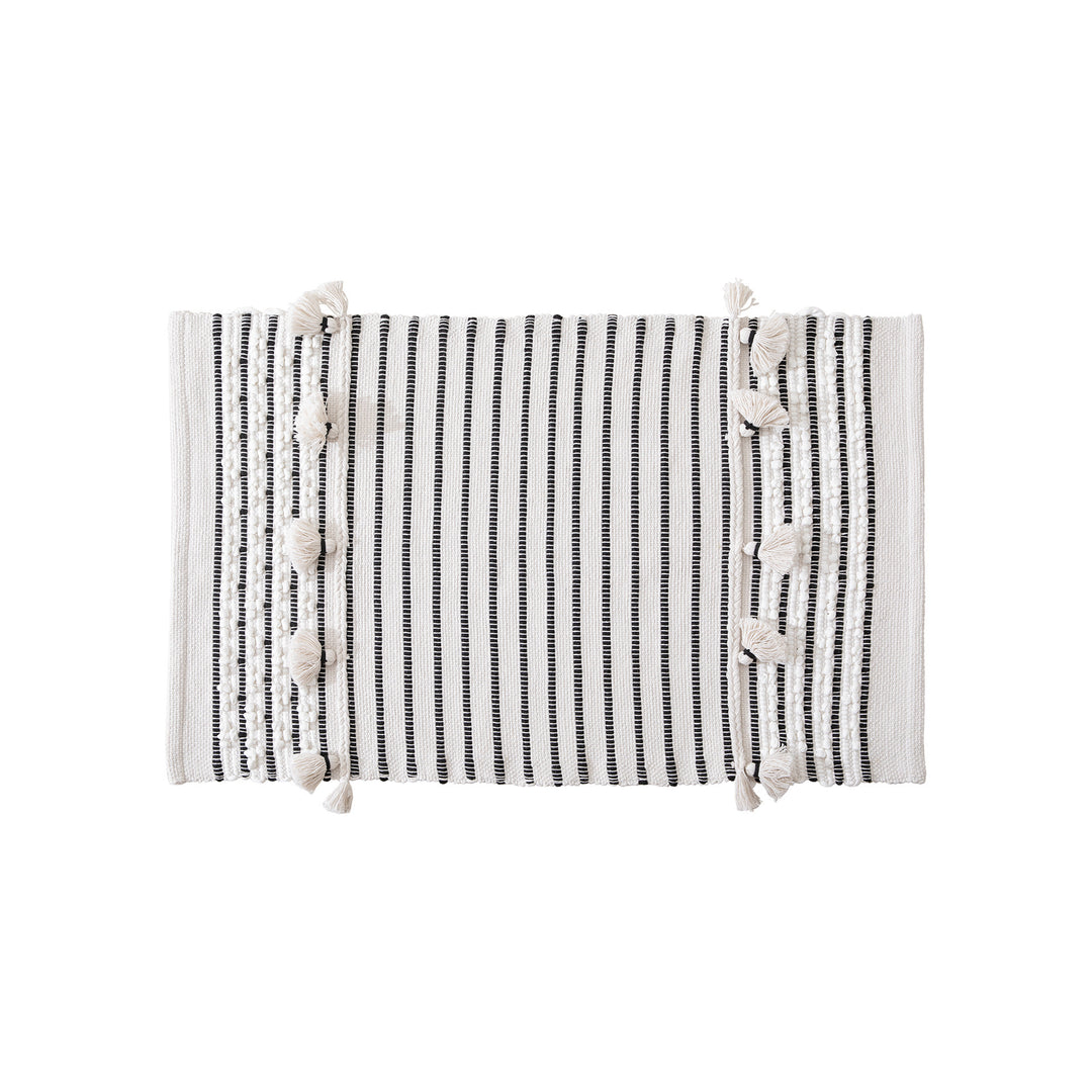 Woven runner with striped pattern, tassels and flat cotton structure