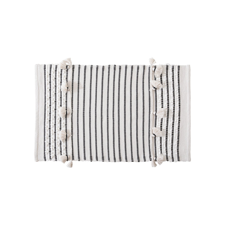 Woven runner with striped pattern, tassels and flat cotton structure