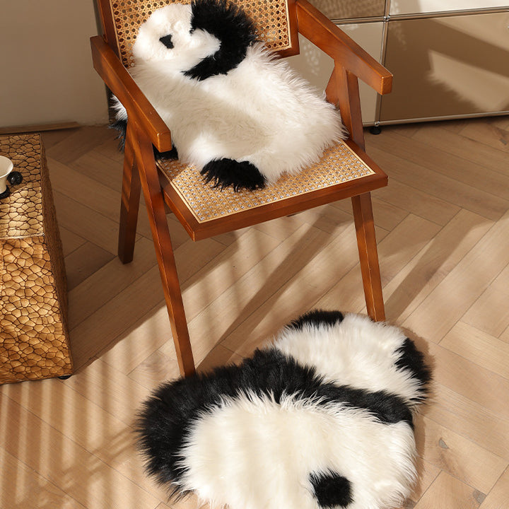 Plush cuddly pillow in sheep shape with dense artificial fur and soft polyester filling