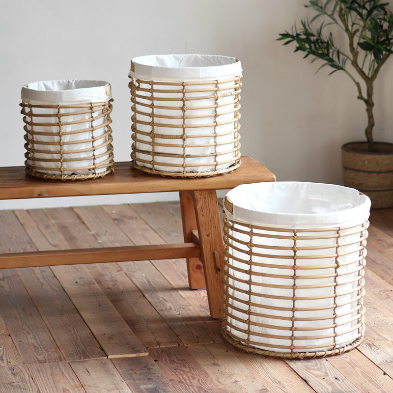 Decorative storage basket with fabric lining