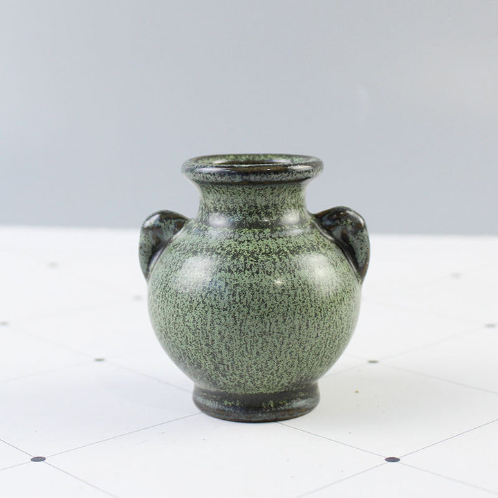 Elegant ceramic vase with artistic design
