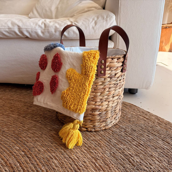 Braided storage basket with leather handles