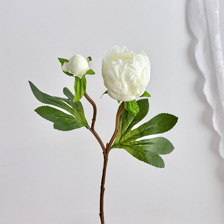 Artificial peony bouquet with delicate flowers and leaves