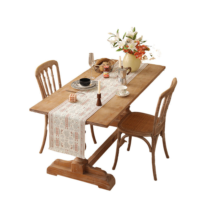 Woven jacquard table runner with floral medallion and fringes