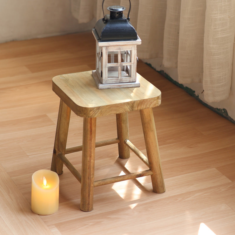Robust stool made of solid wood
