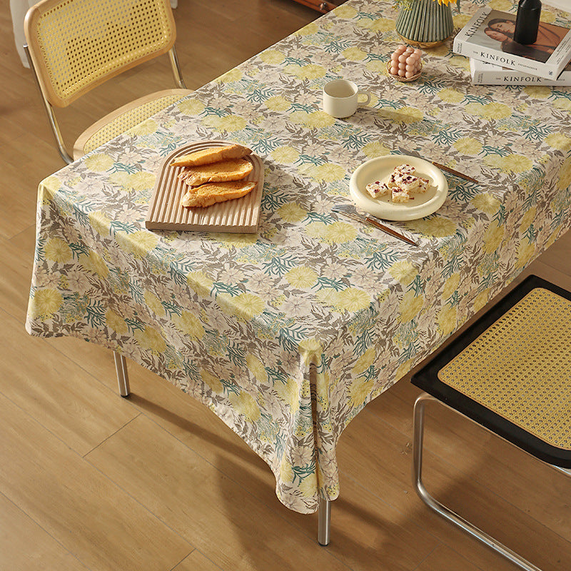 Wipeable tablecloth made of polyester with floral watercolor look and water-repellent coating