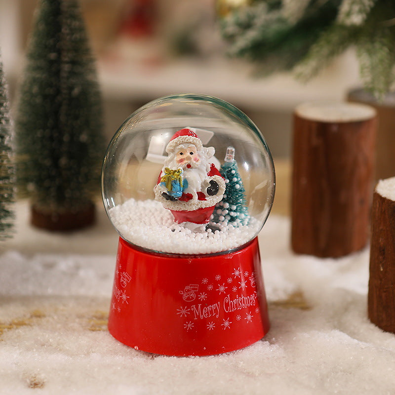 Snow globe with Santa Claus and Christmas tree