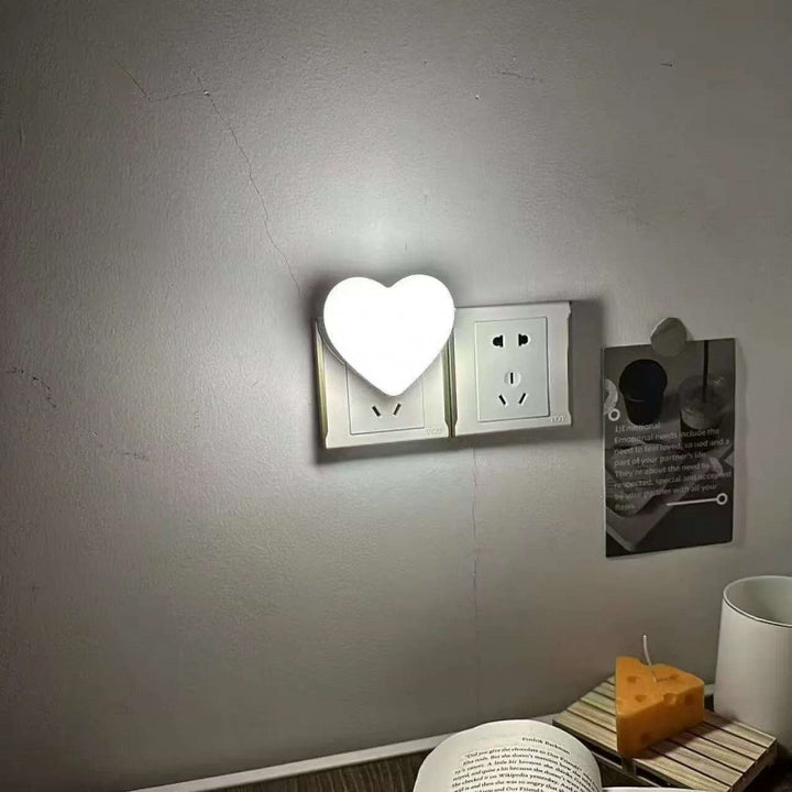 Heart-shaped plug-in ambient night light with soft LED lighting