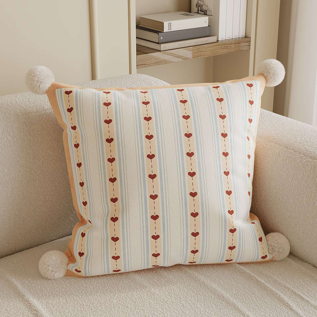 Decorative Throw Pillow with Pom-Pom Corners and Heart Stripe Print