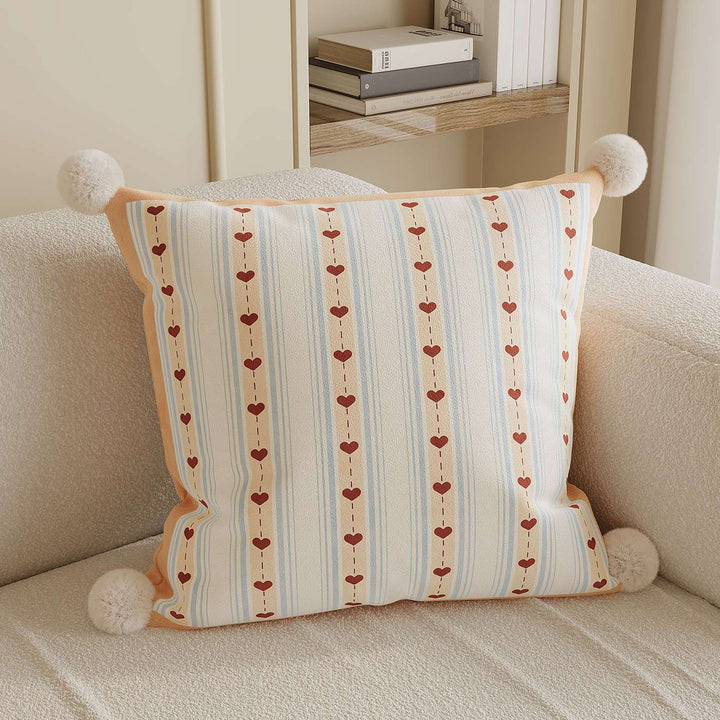 Decorative Throw Pillow with Pom-Pom Corners and Heart Stripe Print