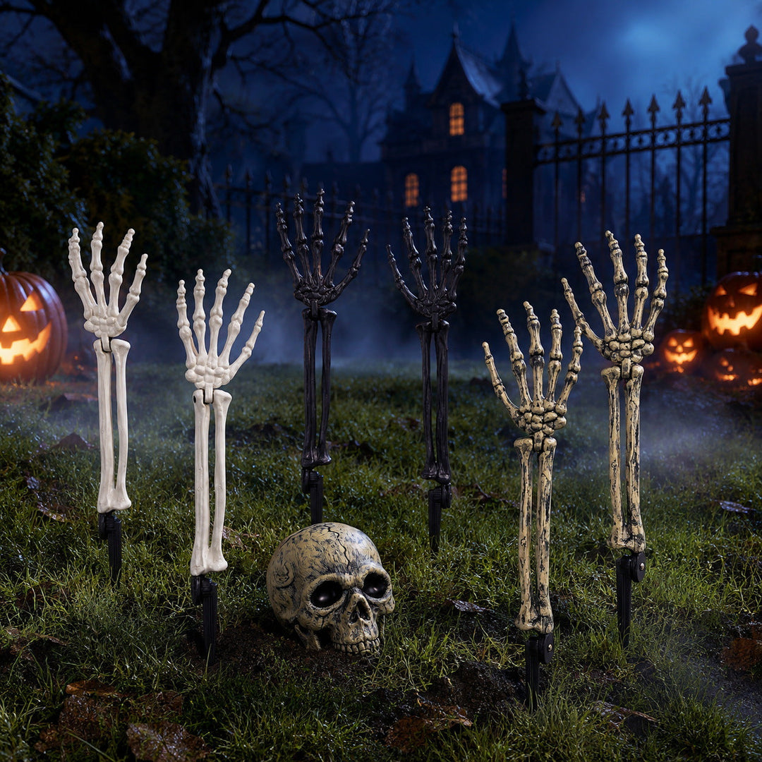 Creepy Halloween decor skeleton tree trunks