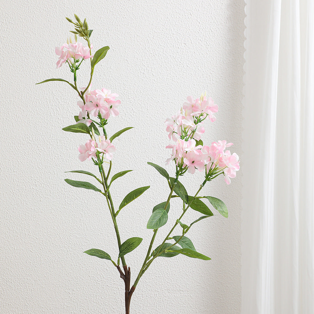 Decorative art branch with white flowers