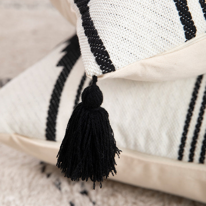 Rectangular Jacquard lumbar cushion cover with geometric ethnic relief and decorative tassels