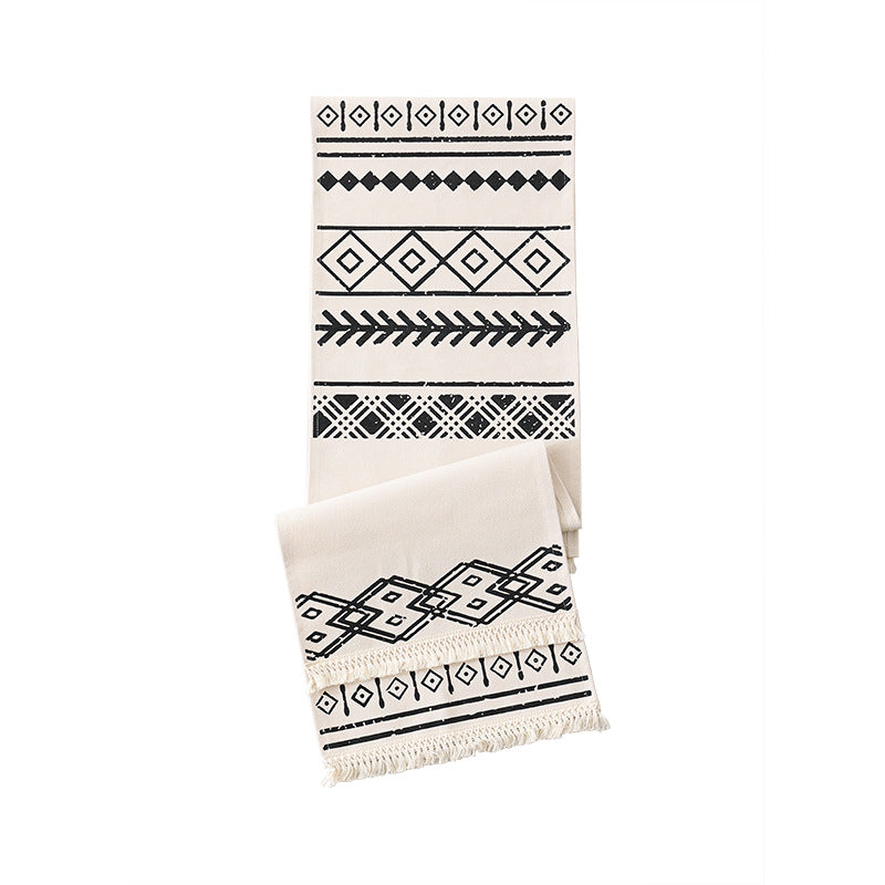 Woven table runner in Boho style with fringes and geometric ethnic print