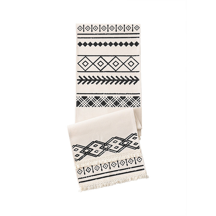 Woven table runner in Boho style with fringes and geometric ethnic print