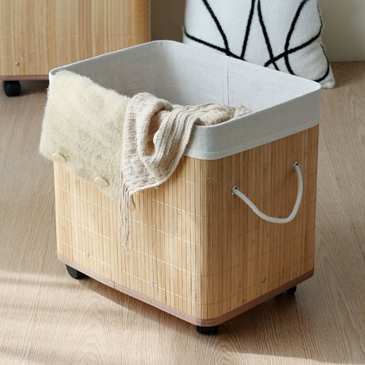 Stylish laundry container with practical lid and carrying handles