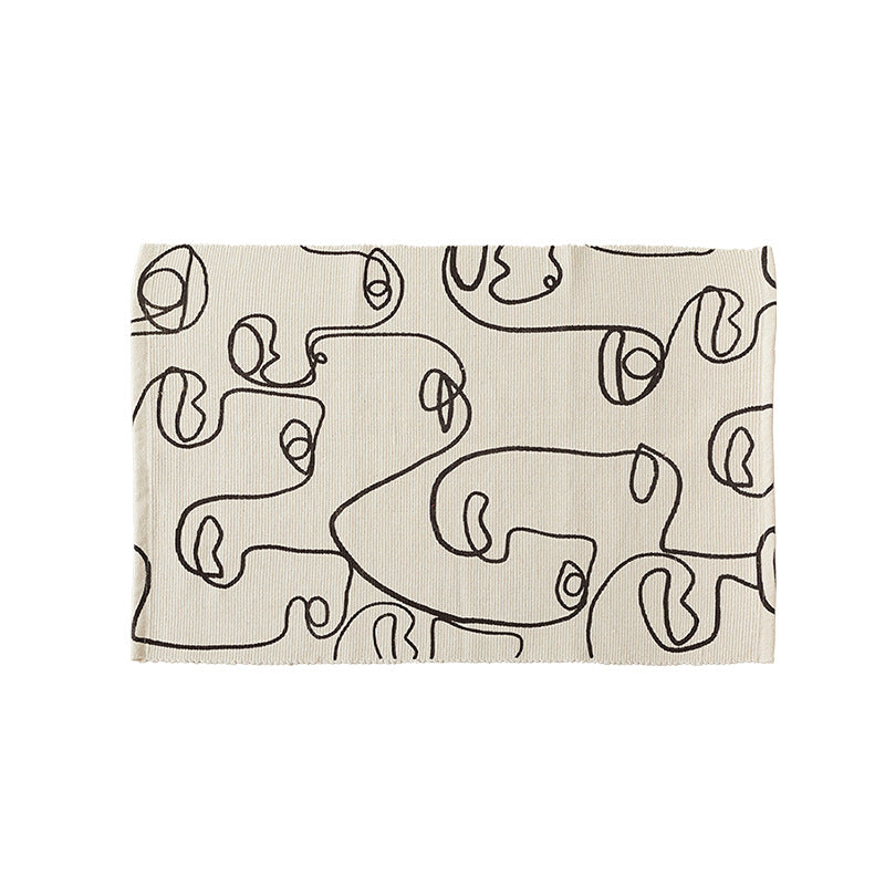 Woven cotton tabletop set with abstract line art