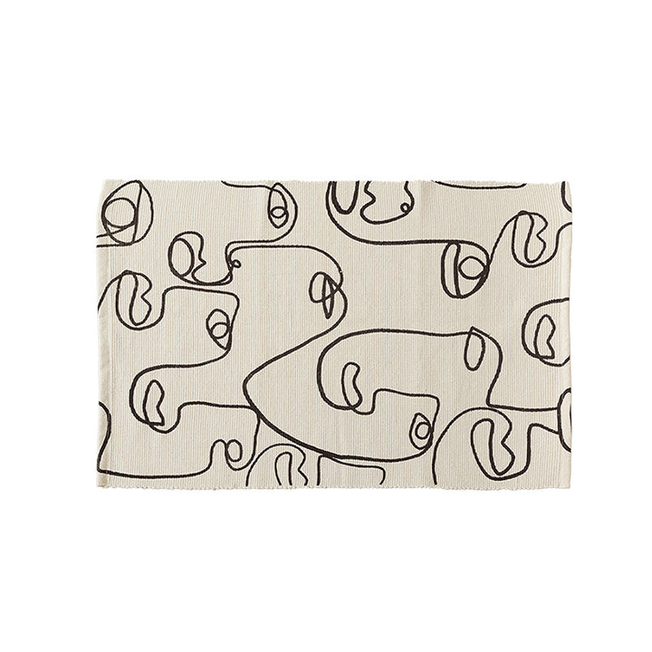 Woven cotton tabletop set with abstract line art