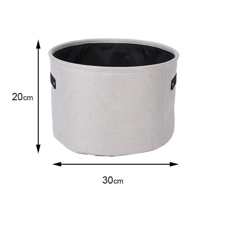 Organizer basket with practical handle and water-repellent inner coating